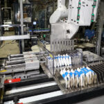 Case packing and palletizing automation end of line