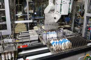 Case packing and palletizing automation end of line